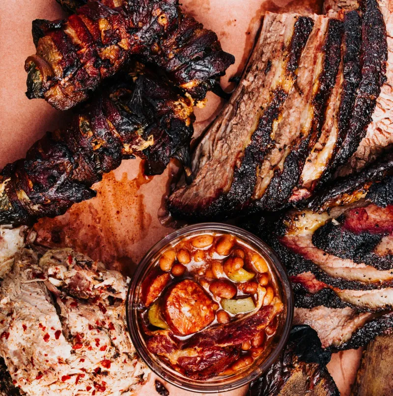 Heritage BBQ spread — brisket, ribs, and more